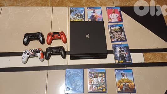 ps4 pro 1TB 4 controller 1 original 8 games