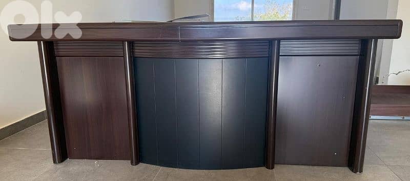 Manager's office with extension ,chair, and a regular desk 1
