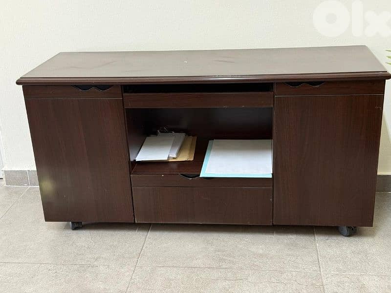 Manager's office with extension ,chair, and a regular desk 3