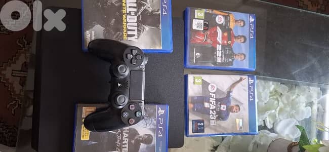 Playstation 4 +4 cds+1 controller