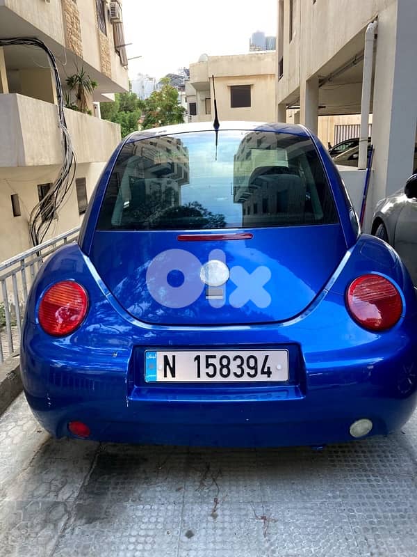 فولكسفاغن نيو بيتل 2003 0