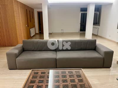 2 big grey couches for sale