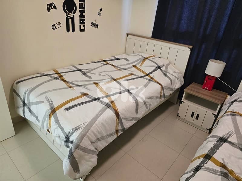 2 beds with night stand without mattress 2