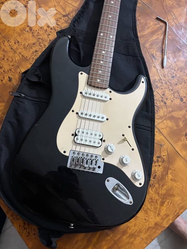 Squier by fender electric guitar 1