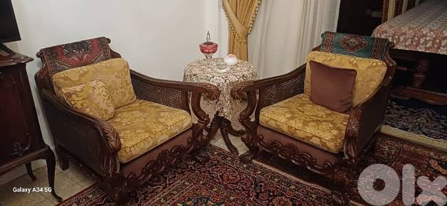 2  sofas with table