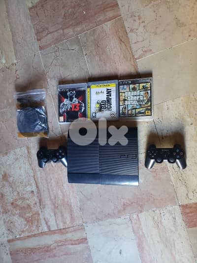 PS3 super slim مع  قبدتين و ٢ العاب:GTA V _BATLLE FEILD BAD COMPANY