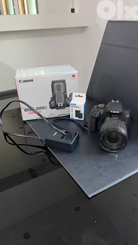 canon eos 2000D+ 2 fc card+ 2 batteries 0