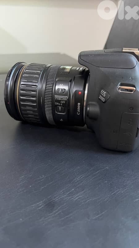 canon eos 2000D+ 2 fc card+ 2 batteries 1