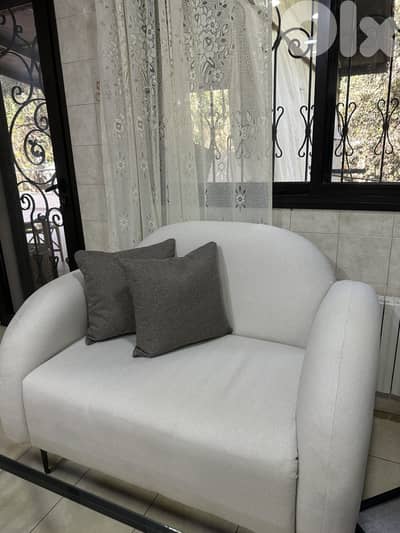 2 beige sofas (one is a 2 seater and the other is a 3 seater)