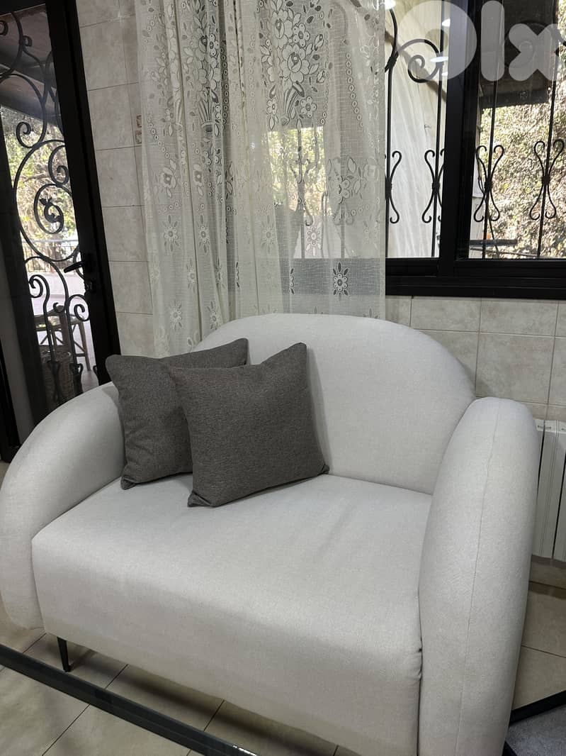 2 beige sofas (one is a 2 seater and the other is a 3 seater) 0