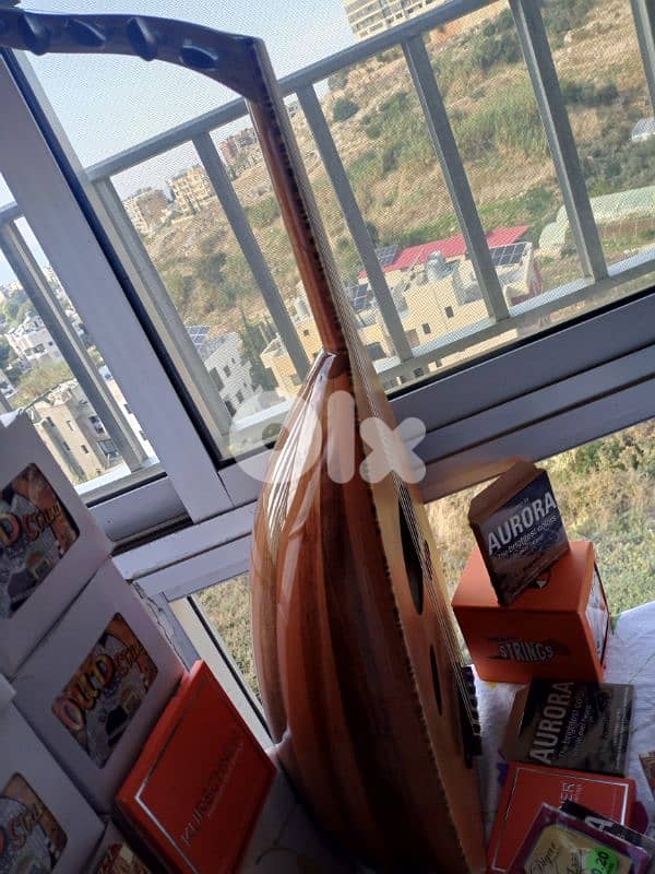 عود مميز بالصوت والأخشاب والصناعة بسعر روعة 7