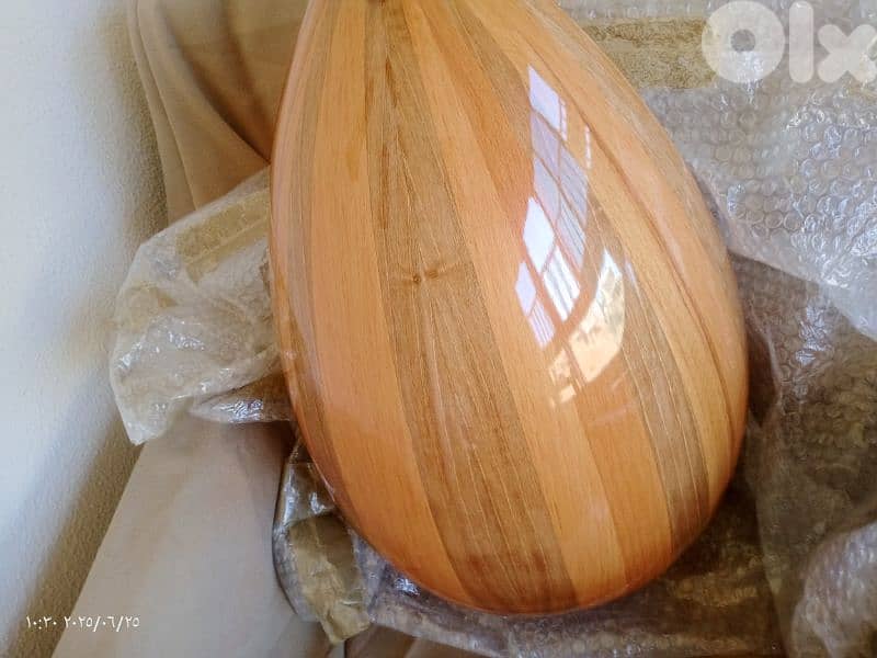 عود مميز بالصوت والأخشاب المستخدمة بالصناعة 13