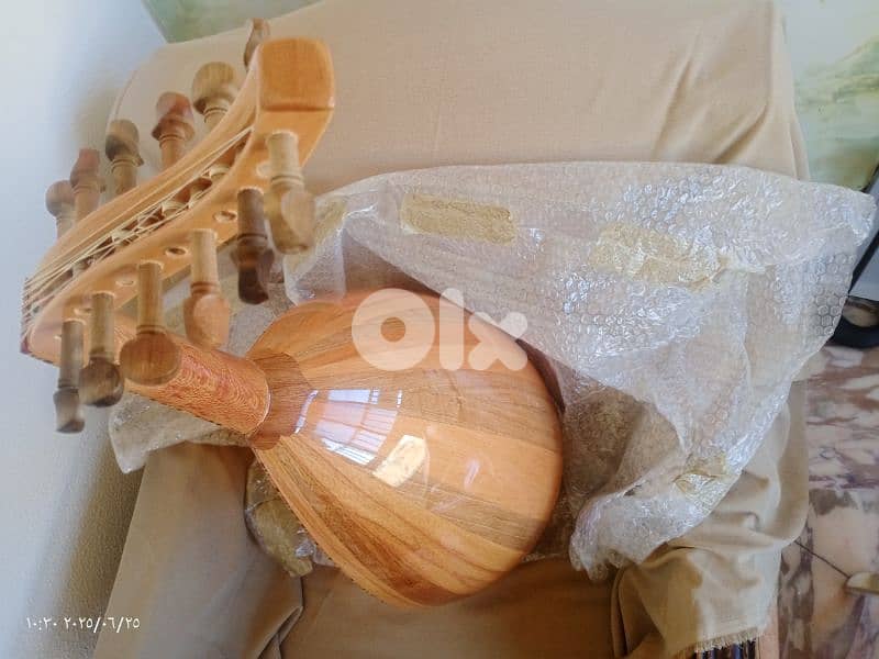 عود مميز بالصوت والأخشاب المستخدمة بالصناعة 14