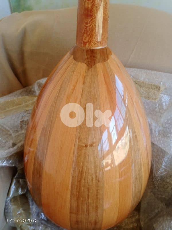 عود مميز بالصوت والأخشاب المستخدمة بالصناعة 15