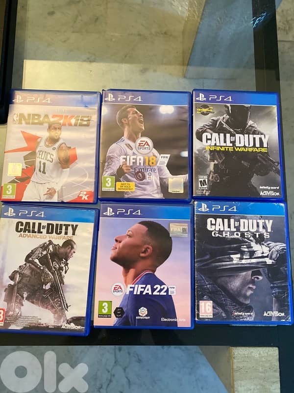 PS4 slim used like new +6 CDs + Controller+HDMI cable 1