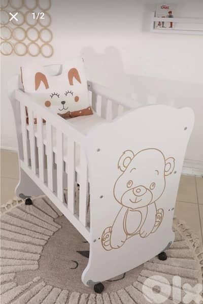 bed for kids with wheels & swing used as new تخت ولادي مع دواليب وهزاز