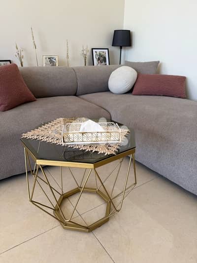 Living room with tables for sale