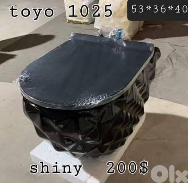 كراسي حمام تعليق اسود. black wall hung toilet seat 2