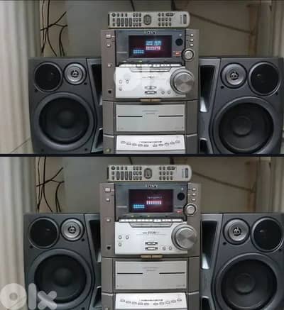 Stereo SONY with 2 aiwa speakers with 3 tall speakers