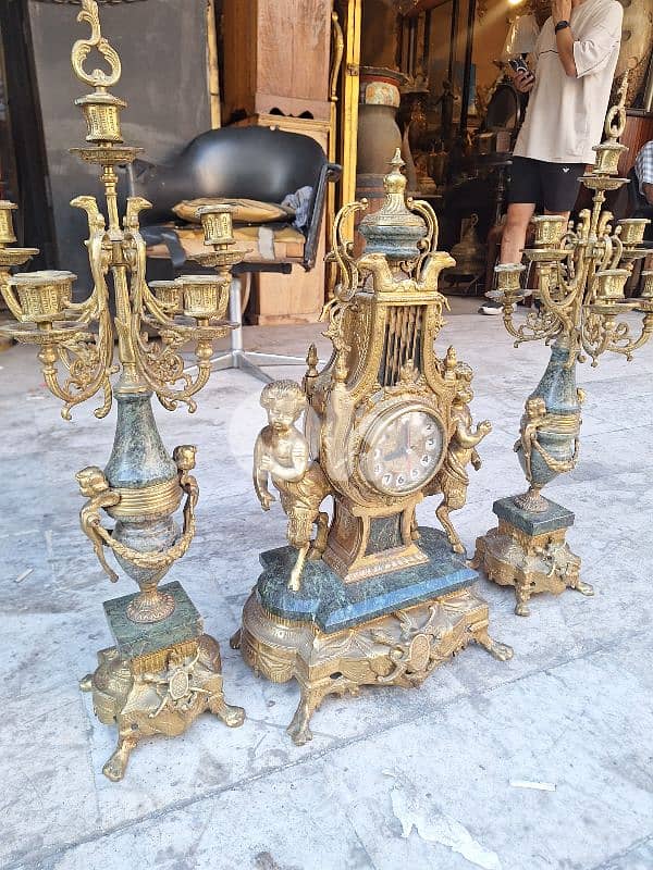 غروب ساعة من شمعدان عدد٢ حجم كبير برونز مع رخام مميز انتيك 1