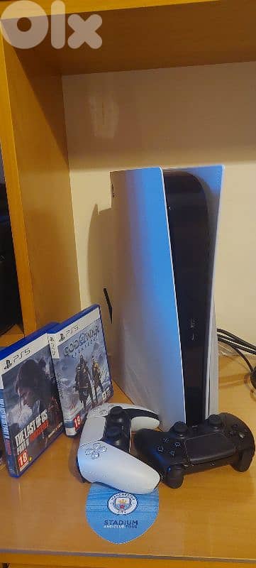 ps5 + 2 controllers + games