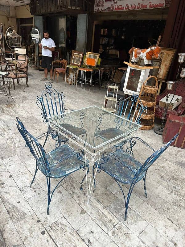 set outdoor ferforge table with 4 chairs طقم خارجي حديد فيرفورجي رائع 0