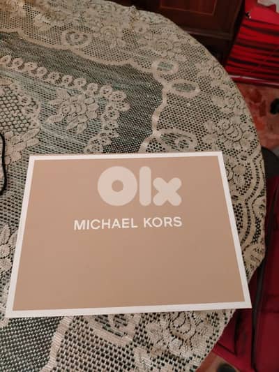 Michael Kors original towel 200$ contact me at 76417078