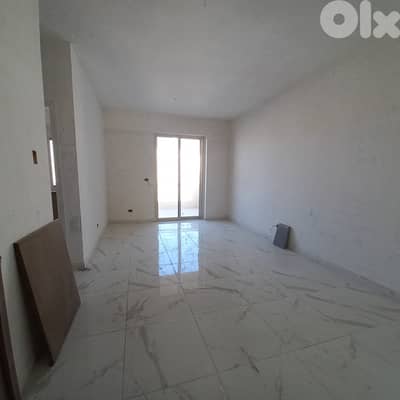 New Built apartment in new building for saleشقة جديدة في مبنى جديد للب