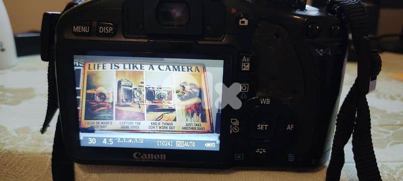 Canon 550D 18MP DSLR body with battery and charger 1