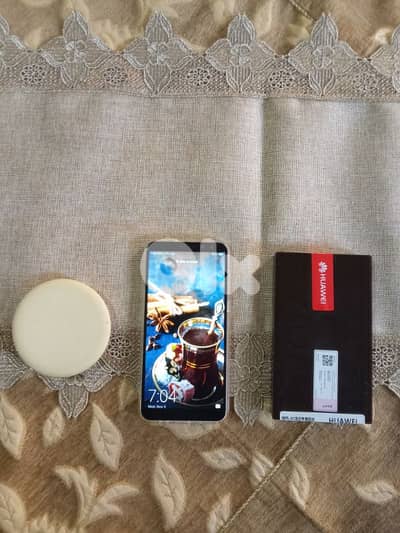 تلفون هواوي للبيع معو بطارية من شركة و كفر و قطعة من شركة السعر 65$