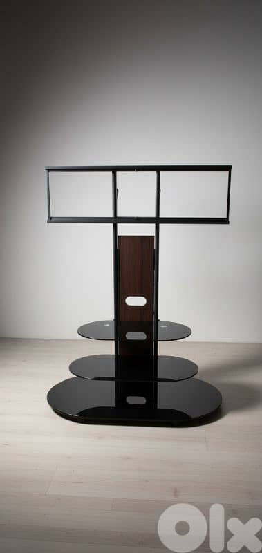 طاولة تلفزيون زجاج وحديد – ستايل عصري 0