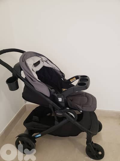 عرباية أطفال ماركة graco  مستعملة فقط لمدّة ٣ أشهر