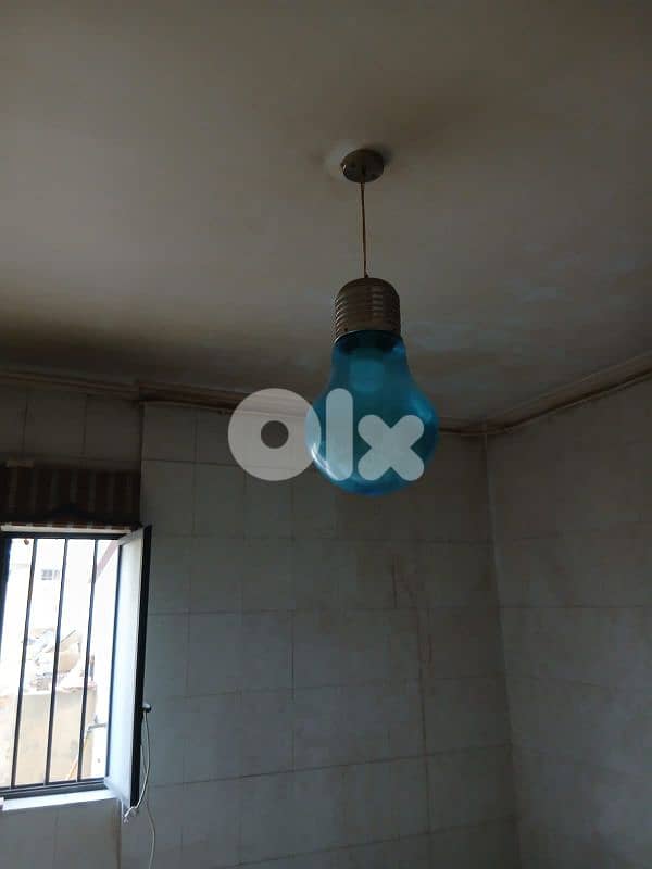 صالونان برادي  طاولة كبيرة و ٢ صغار  ثريات ولمبات 11