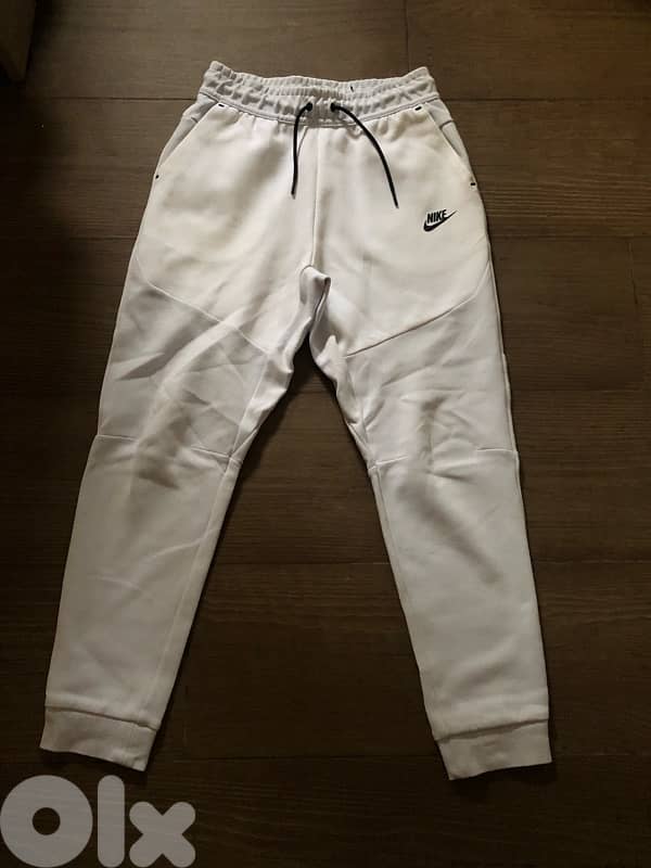 baby blue/white nike pants 0