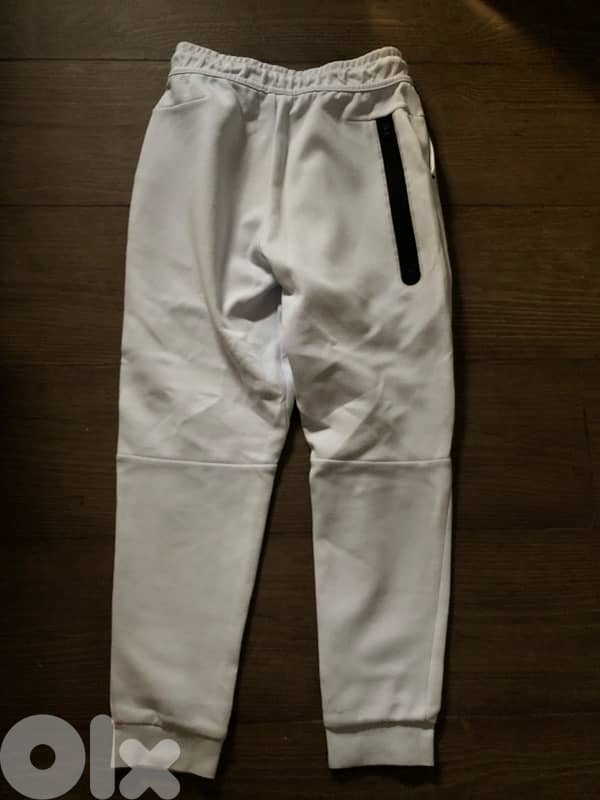 baby blue/white nike pants 1