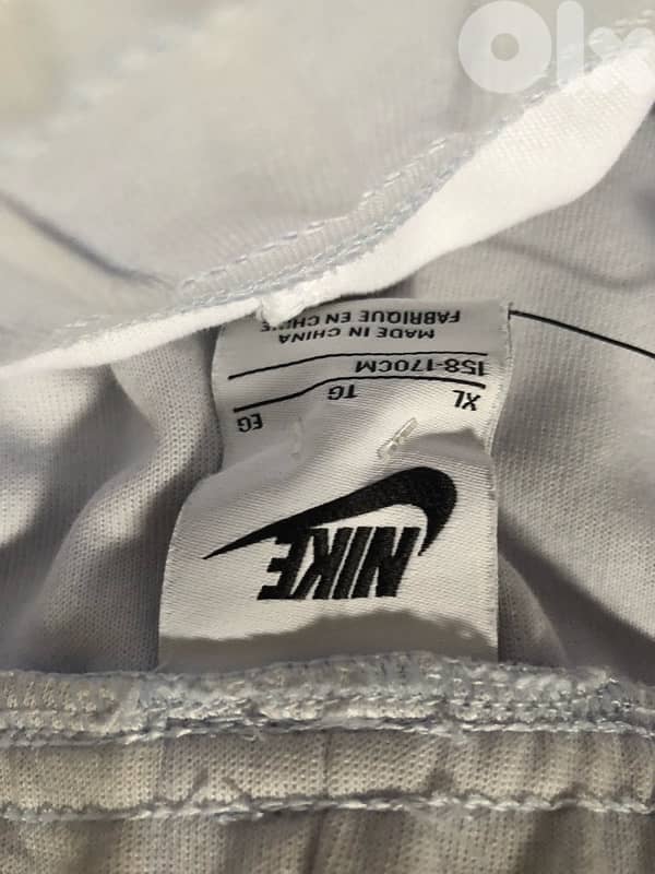 baby blue/white nike pants 2