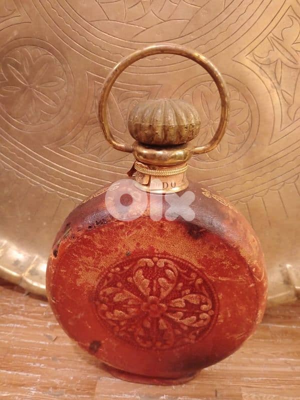 قنينة قديمة زجاج ملبس جلد فرنسية 0