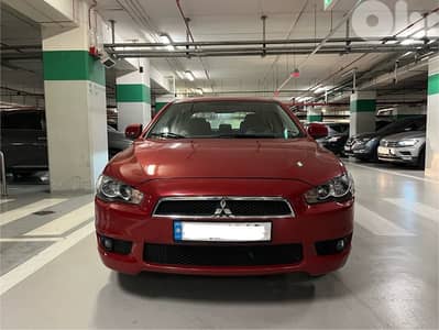 Mitsubishi Lancer (company source)(low mileage)