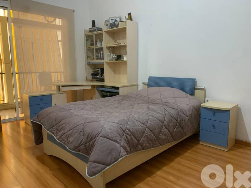 Like-new Twin XL Bed (120 cm) with mattress, sheets + bedside table. 0