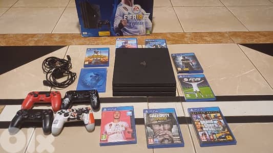 ps4 pro with 9 video game and 4 cotroller [1 TERA 4K]