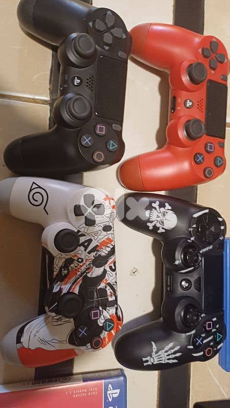 ps4 pro with 9 video game and 4 cotroller [1 TERA 4K] 1