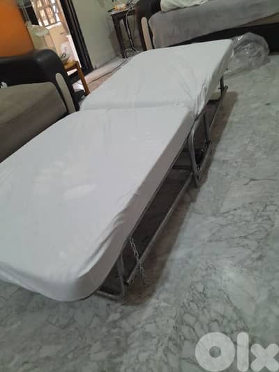 modern folded bed white