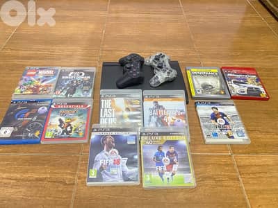 PS3 with 11 video games and 2 consoles(115$)