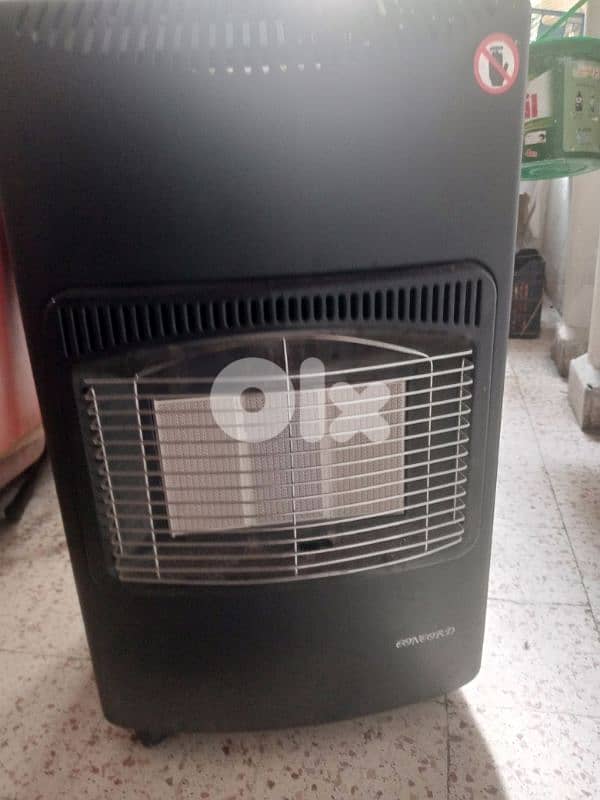 دفاية غاز مع ساعة للبيع 1