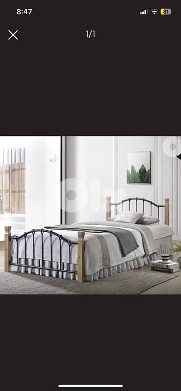 BRAND NEW metal frame bed 0