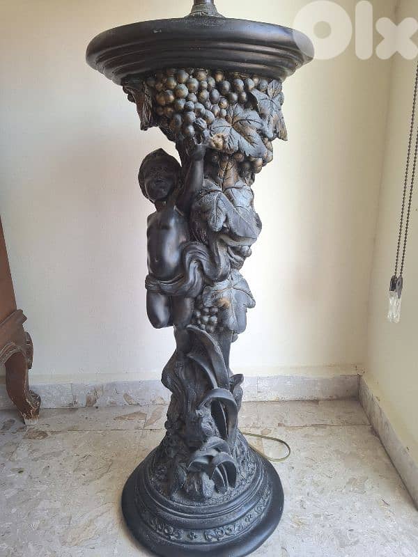 Antique statue with lamp 1