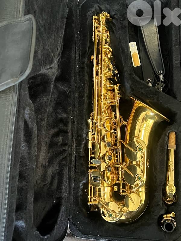 Saxophone alto Eb Kronitz gold color/ black keys barely used 0