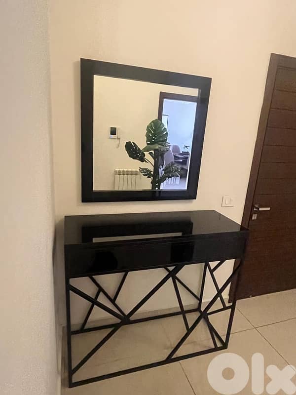 Console table with a wall mounted mirror 1