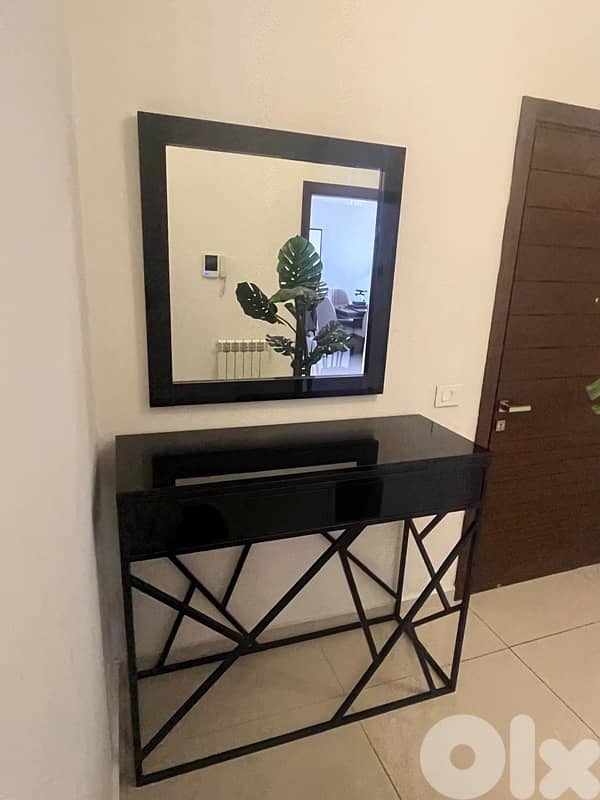 Console table with a wall mounted mirror 3
