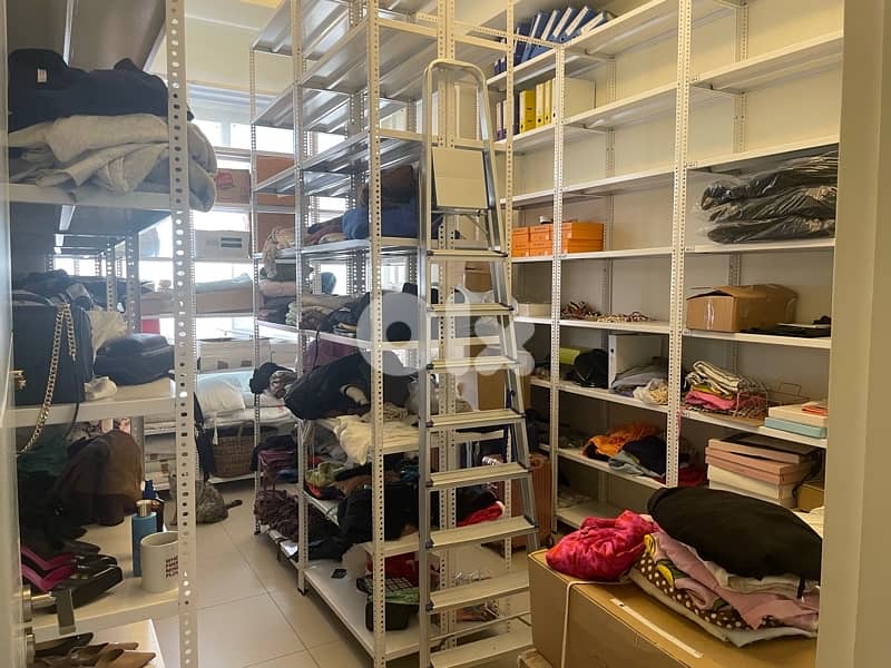 تصفية مستودع ملابس Full stock of clothing 1